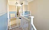 The bedrooms are located on the first floor.  - Thumbnail Image