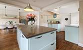 The kitchen is beautifully styled in pastel shades.  - Thumbnail Image