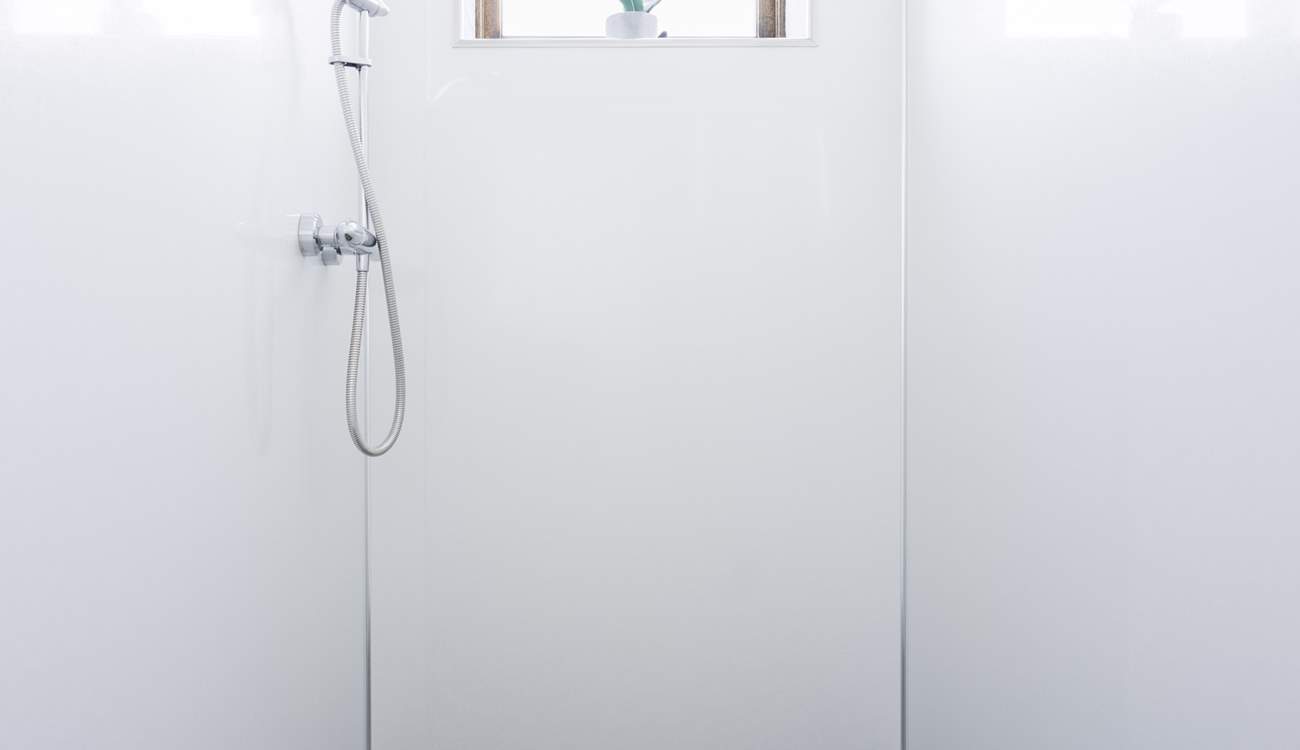 A handy wet-room is situated on the ground floor, perfect for rinsing salty toes.