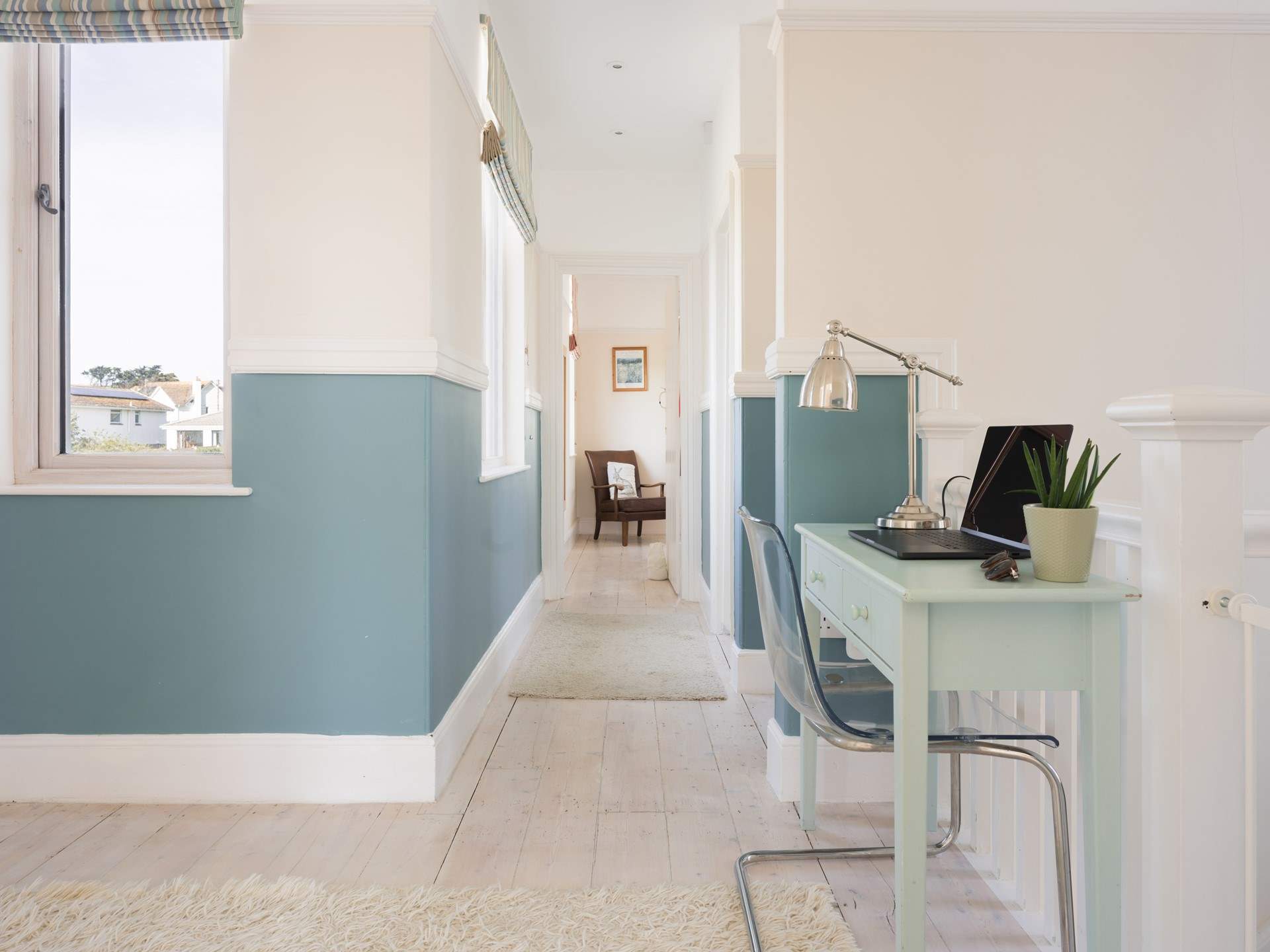 Head down the hall passing the family bathroom.