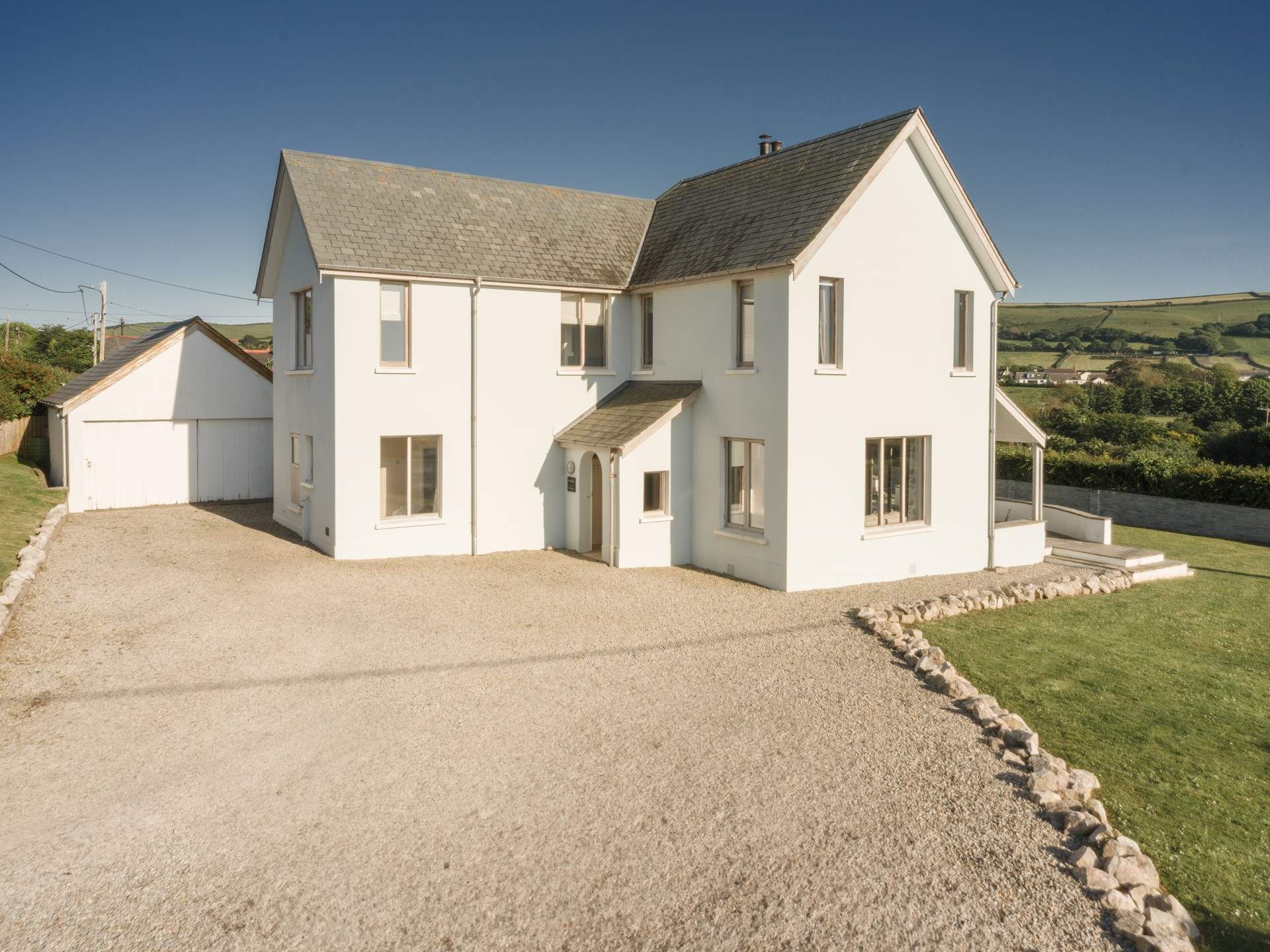 Broad-De sits on a large plot with fabulous views, there's also enough parking for family and friends. 