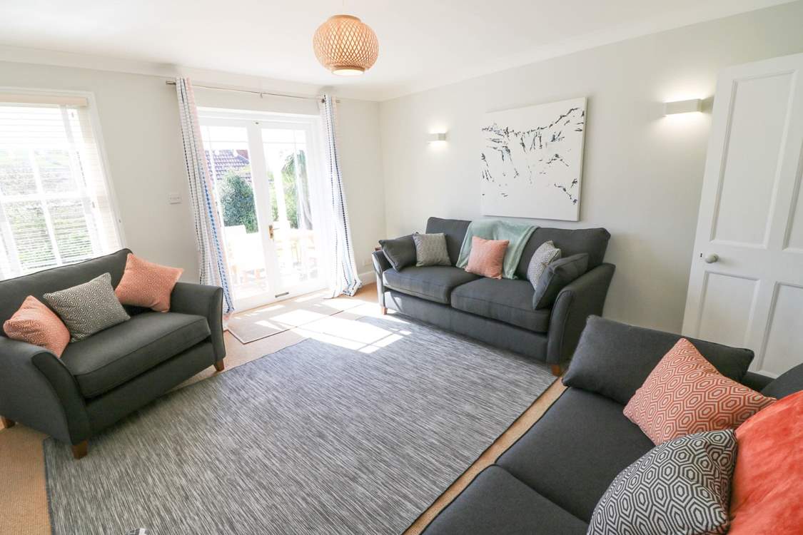 The comfortable sitting-room has a Smart TV.