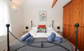 The bedrooms are nicely furnished.  - Thumbnail Image