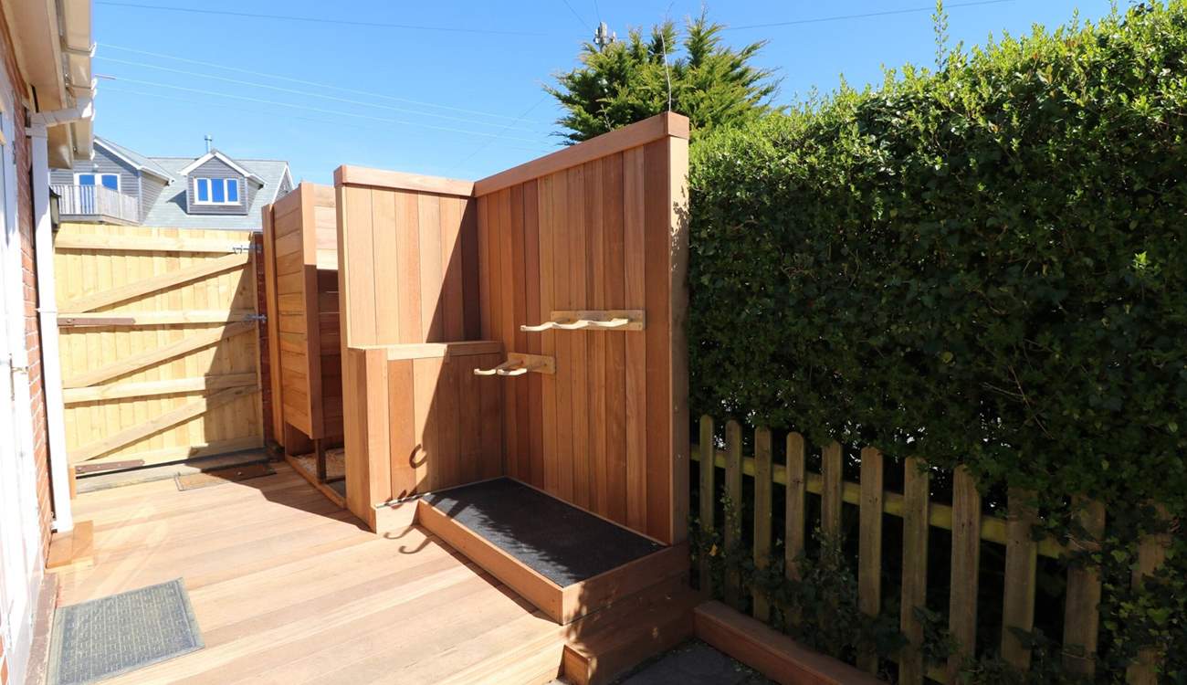 Outside you will find cleverly crafted space for surf boards, wet suits and a shower. 