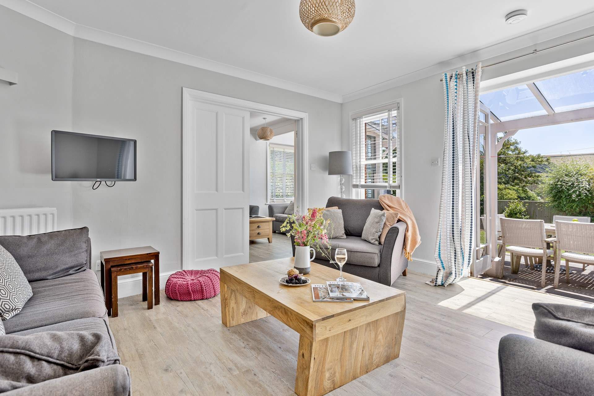 Comfy sofas await in the sitting-room. 