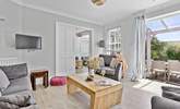 Comfy sofas await in the sitting-room.  - Thumbnail Image