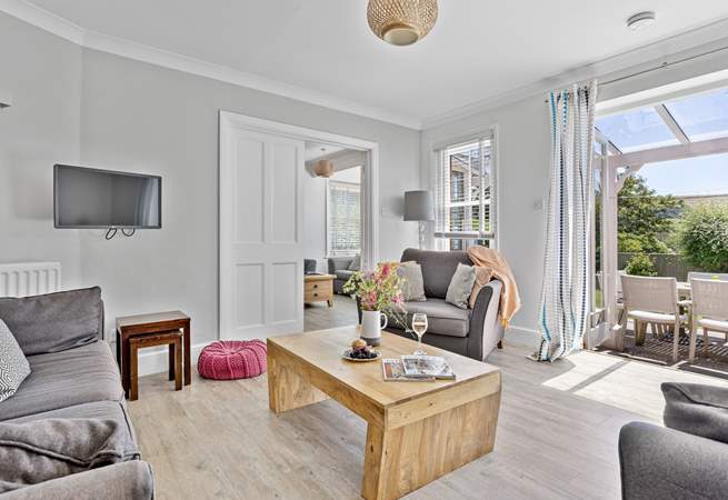 Comfy sofas await in the sitting-room. 