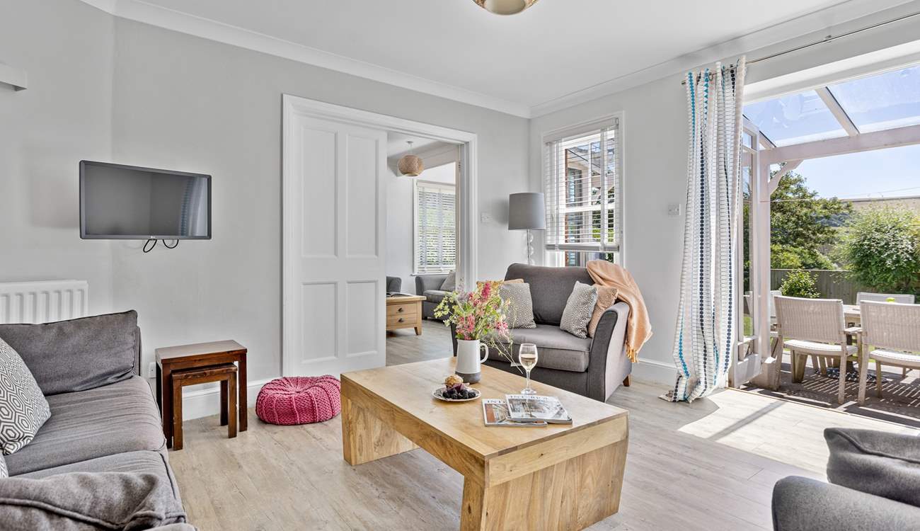 Comfy sofas await in the sitting-room. 