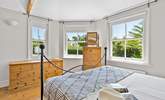 Triple aspect windows let the light flood into this gorgeous bedroom on the ground floor.  - Thumbnail Image