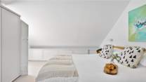 This gorgeous bedroom is on the first floor. 