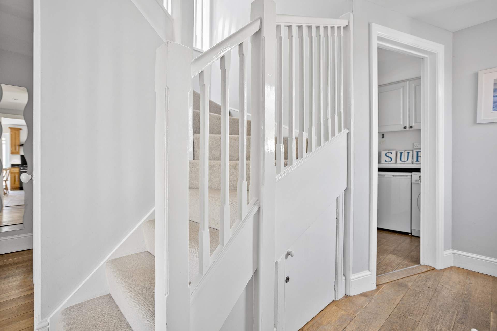 Stairs lead to the first floor bedrooms. 