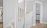Stairs lead to the first floor bedrooms.  - Thumbnail Image