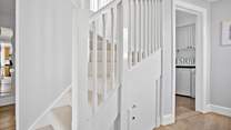 Stairs lead to the first floor bedrooms. 