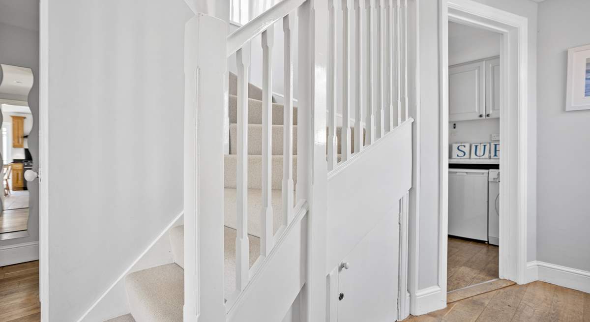 Stairs lead to the first floor bedrooms. 