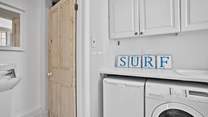 The handy utility-room has a washing machine and tumble-drier, plus a shower, WC and wash-basin. 
