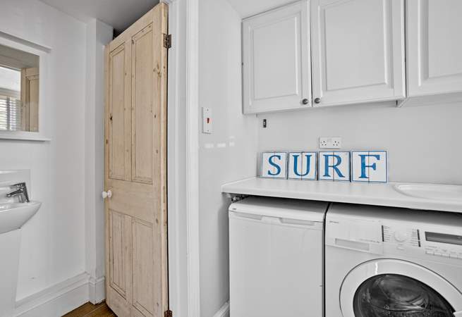 The handy utility-room has a washing machine and tumble-drier, plus a shower, WC and wash-basin. 