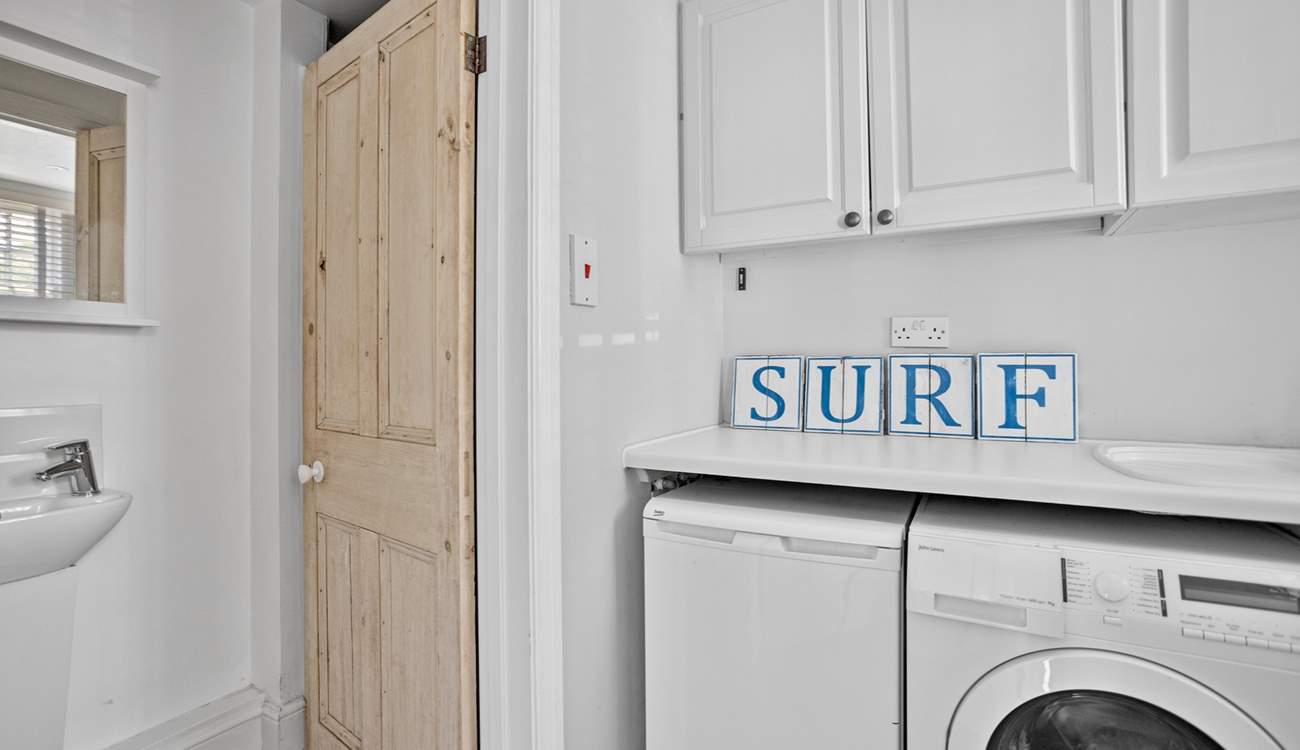 The handy utility-room has a washing machine and tumble-drier, plus a shower, WC and wash-basin. 