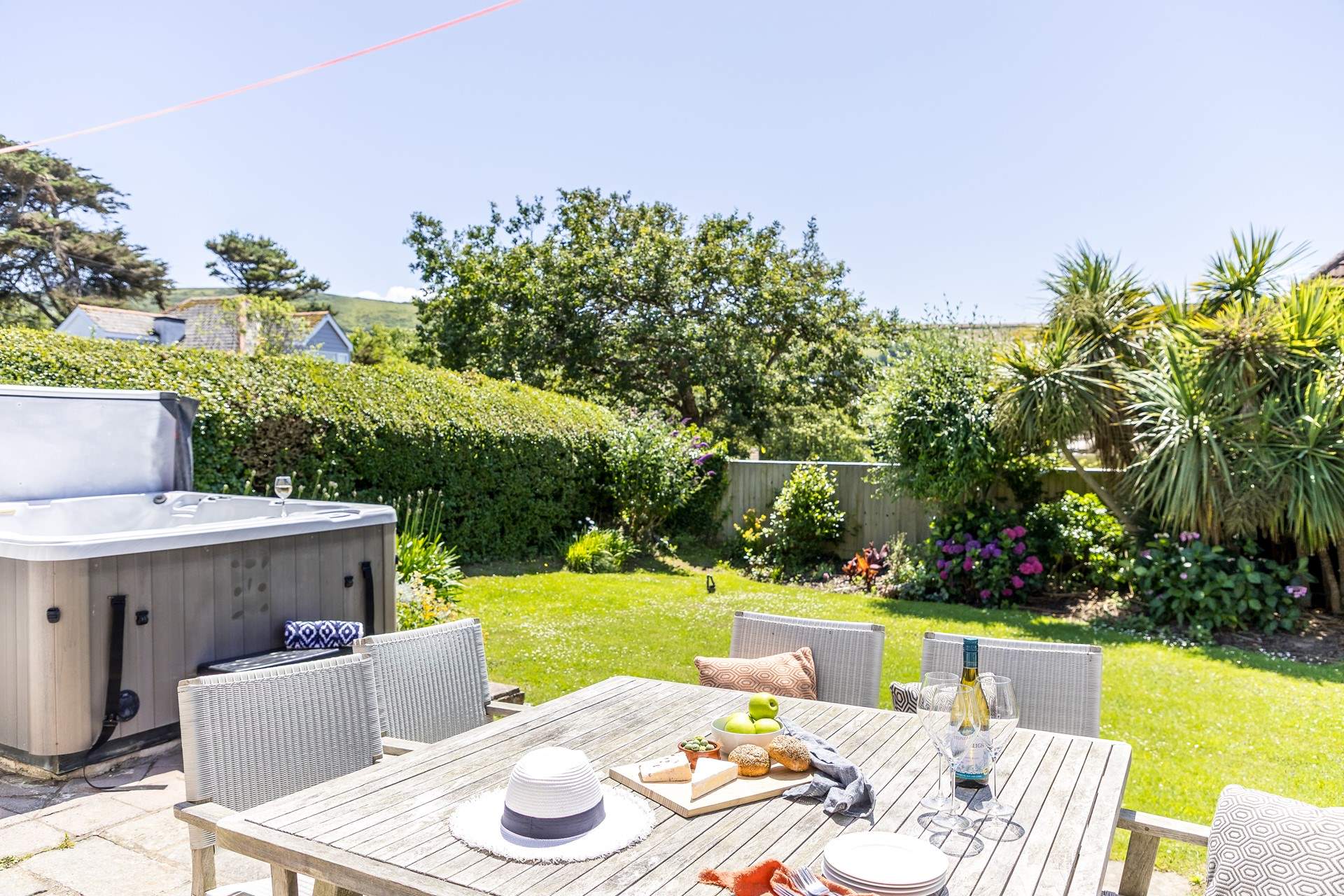 The enclosed garden is perfect for al fresco dining. 