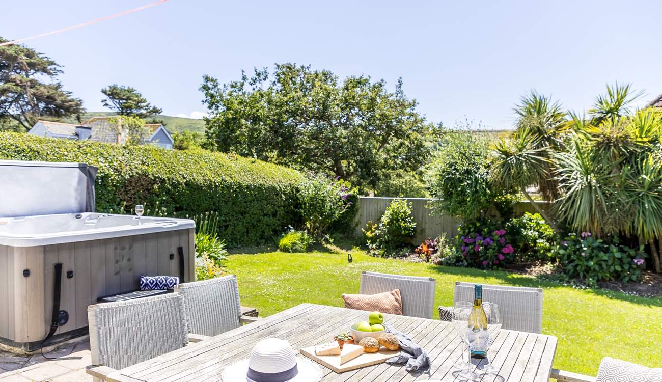 The enclosed garden is perfect for al fresco dining. 