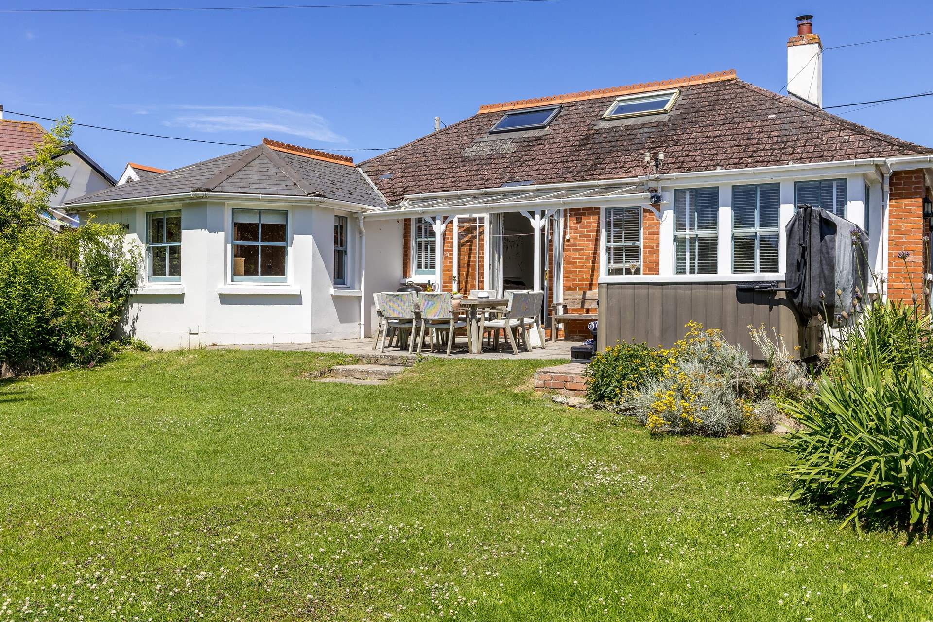 The enclosed garden is perfect for children and the family dogs. 