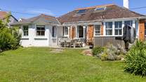 The enclosed garden is perfect for children and the family dogs. 