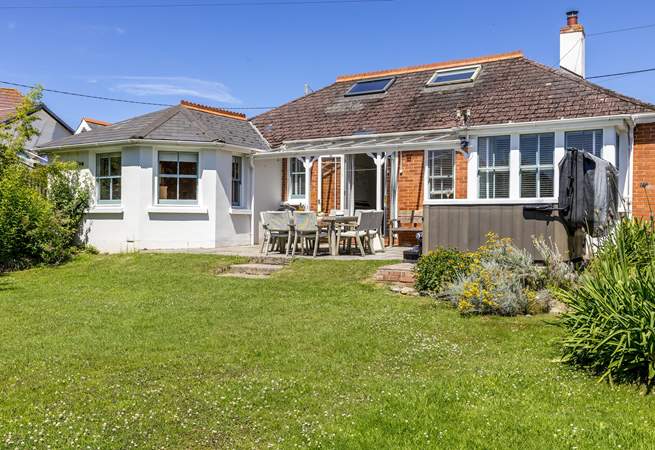 The enclosed garden is perfect for children and the family dogs. 