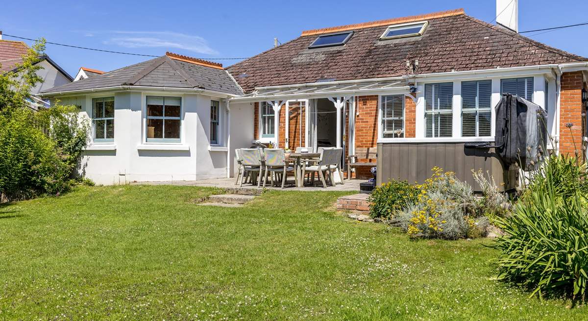 The enclosed garden is perfect for children and the family dogs. 