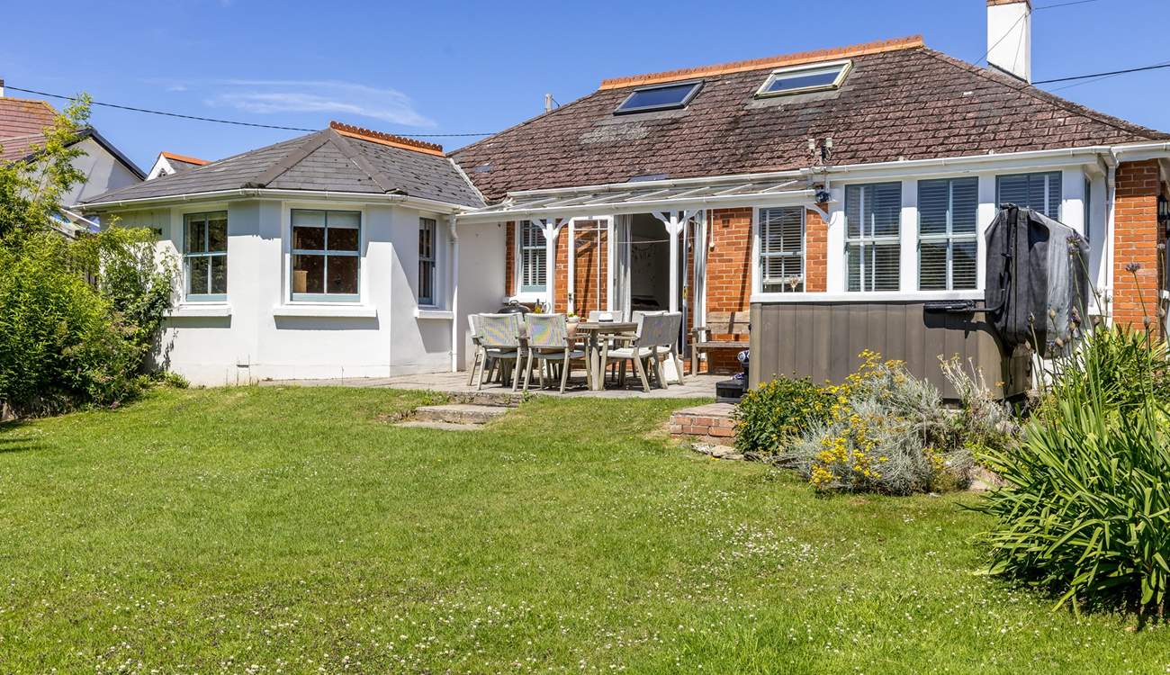 The enclosed garden is perfect for children and the family dogs. 