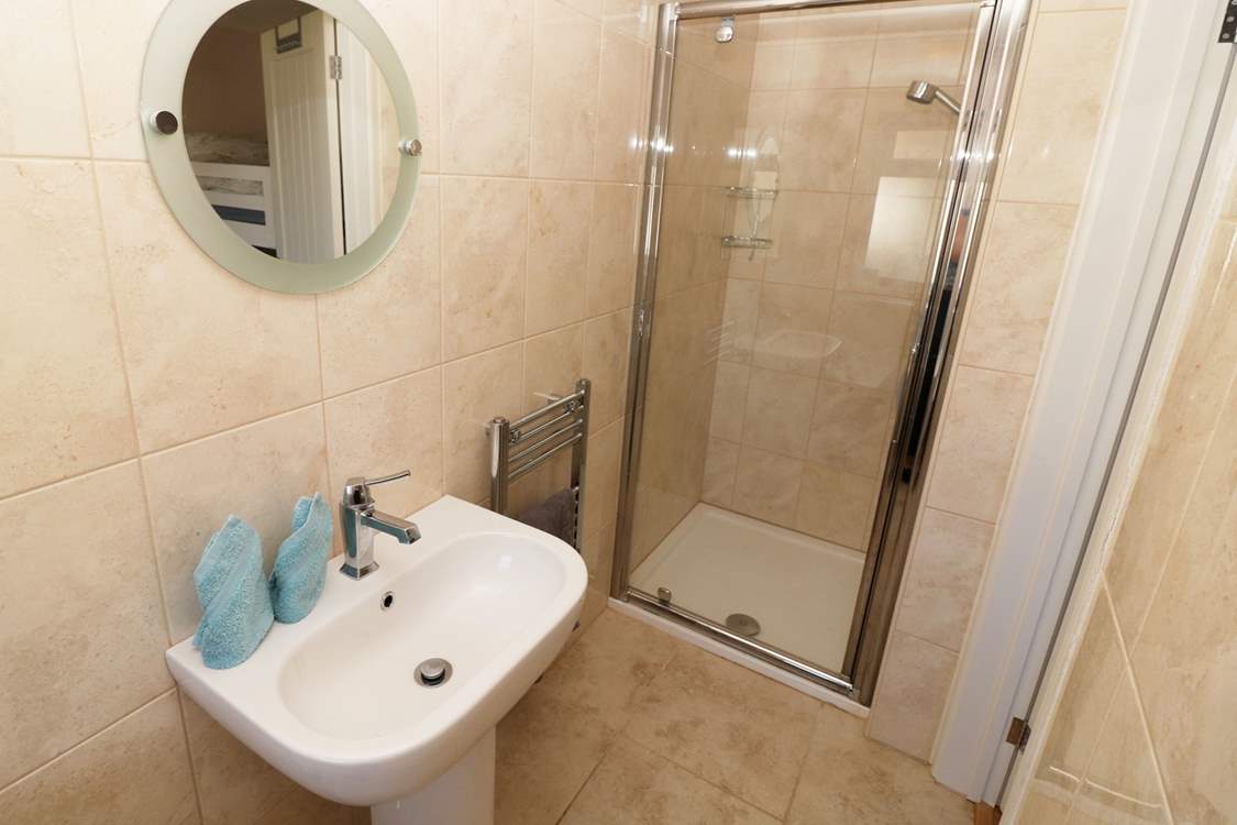 The bunk room has an en suite shower-room.