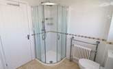 The family bathroom has a free-standing bath and a shower cubicle.  - Thumbnail Image
