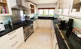 The impressive kitchen has all the equipment you will need.  - Thumbnail Image
