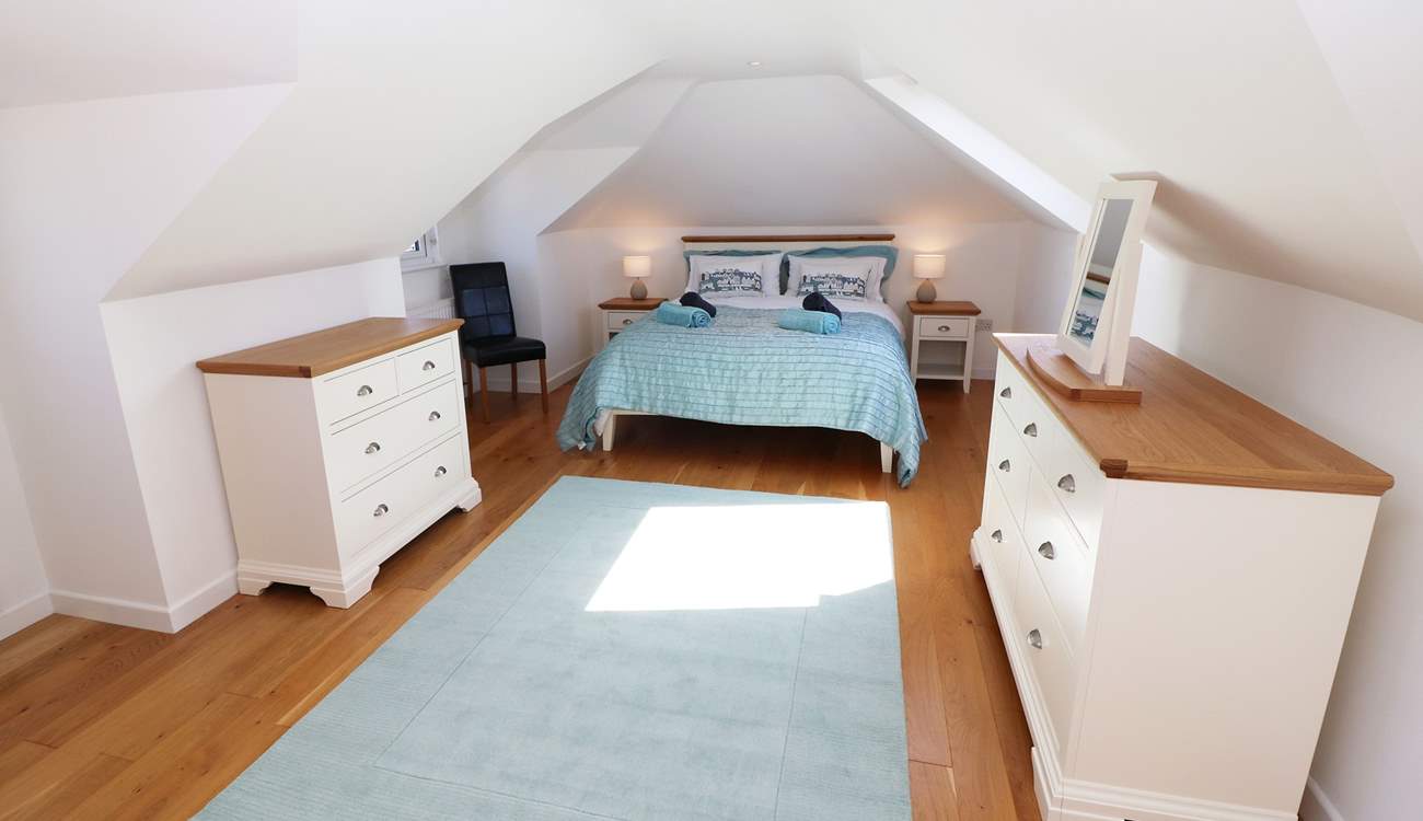 The pretty principal bedroom is on the first floor. 