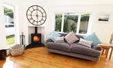 The warming wood-burner will keep you cosy on cooler evenings. - Thumbnail Image