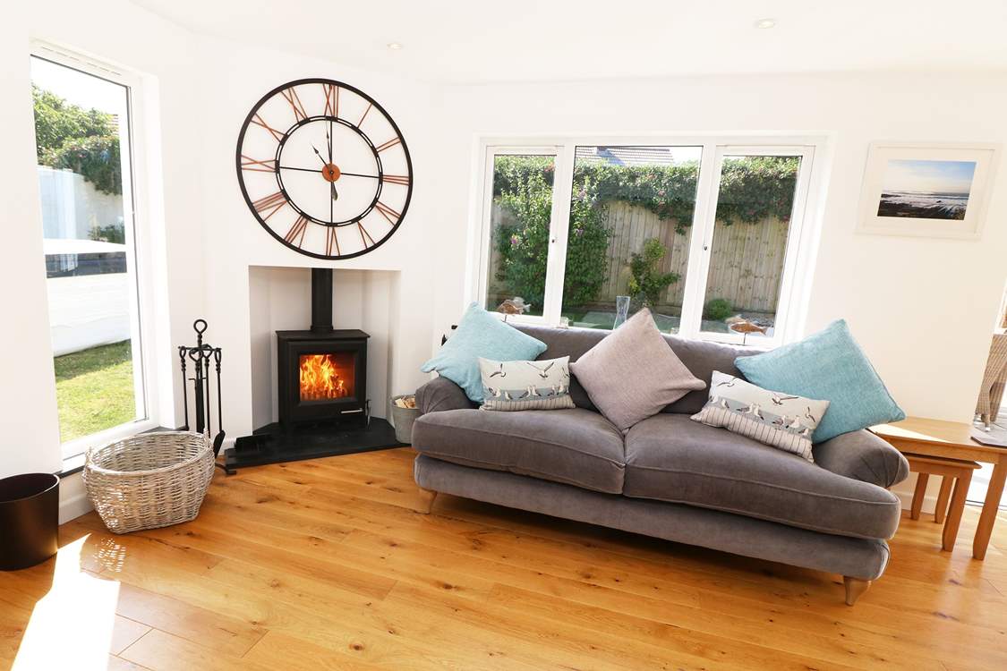 The warming wood-burner will keep you cosy on cooler evenings.