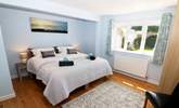 The bedrooms are decorated in cool, seaside colours.  - Thumbnail Image
