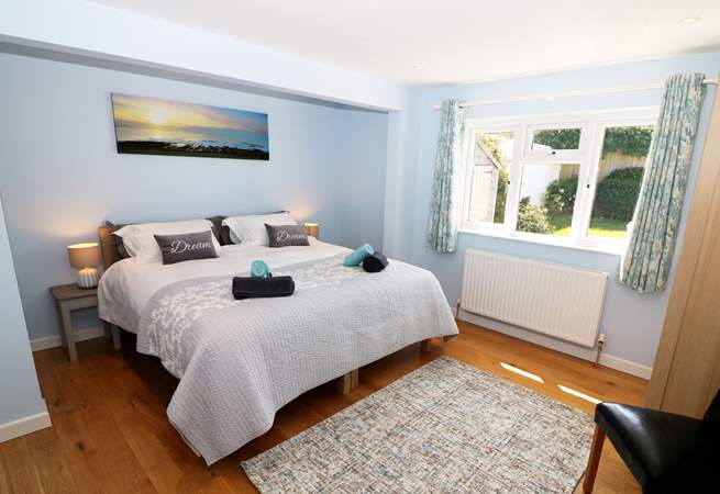 The bedrooms are decorated in cool, seaside colours. 