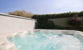 Relax in the hot tub, the ideal holiday pastime.  - Thumbnail Image