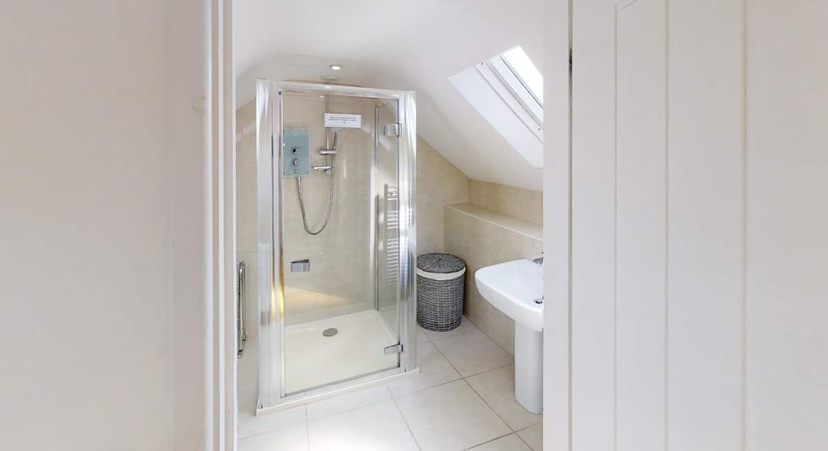 The principal bedroom has a gorgeous en suite shower-room. 