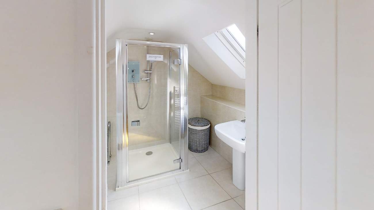 The principal bedroom has a gorgeous en suite shower-room.