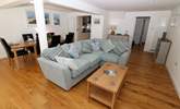 Snuggle up on the corner sofa. - Thumbnail Image