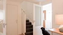 Off of the hallway you will find all the bedrooms and bathrooms.