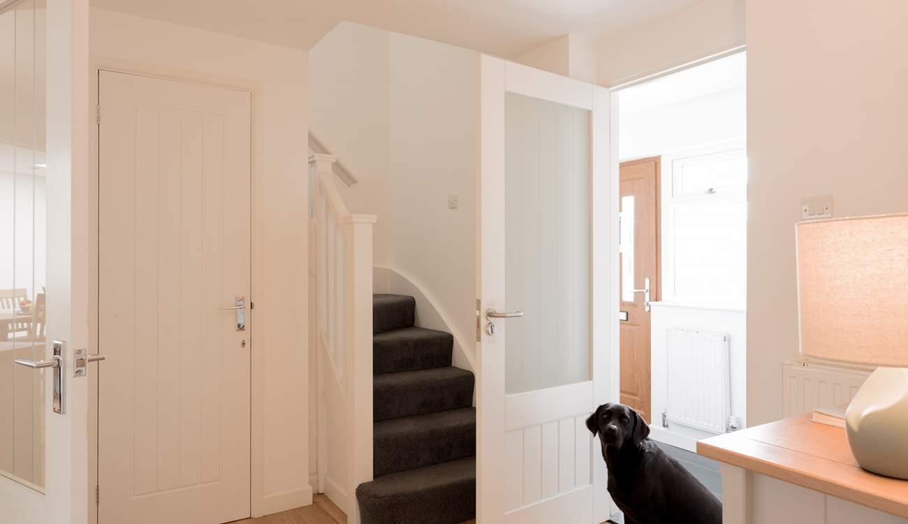 Off of the hallway you will find all the bedrooms and bathrooms.