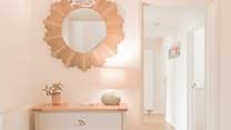 Head back downstairs to find the final three bedrooms. 