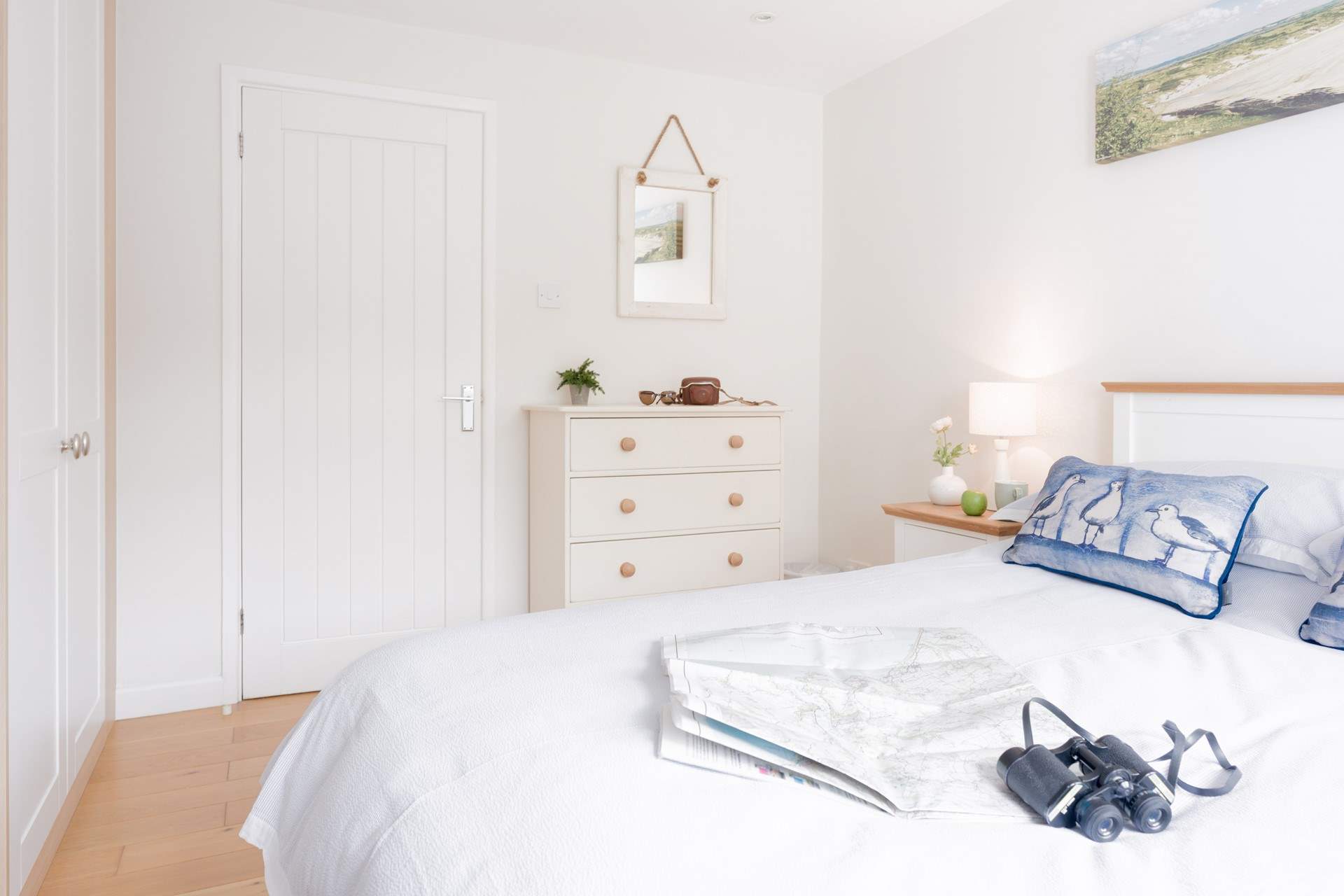Muted tones and a lovely costal theme. 