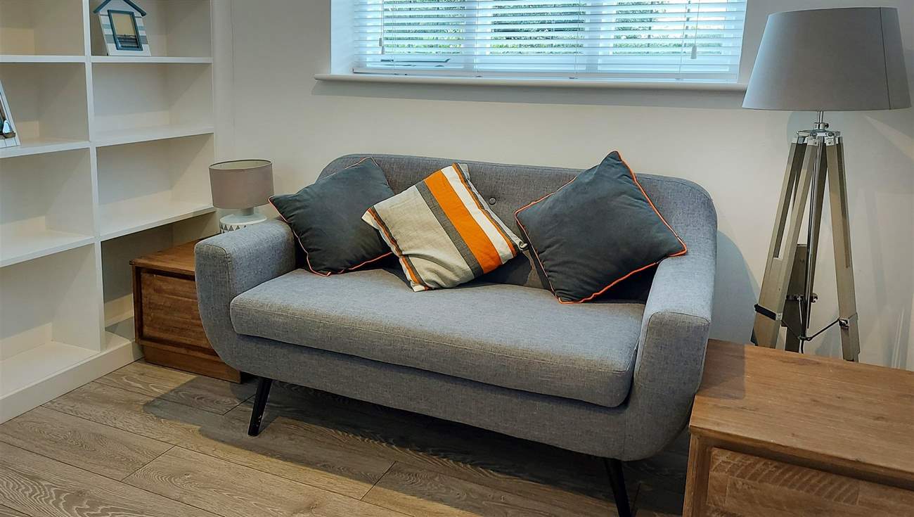 Cosy up in the snug.