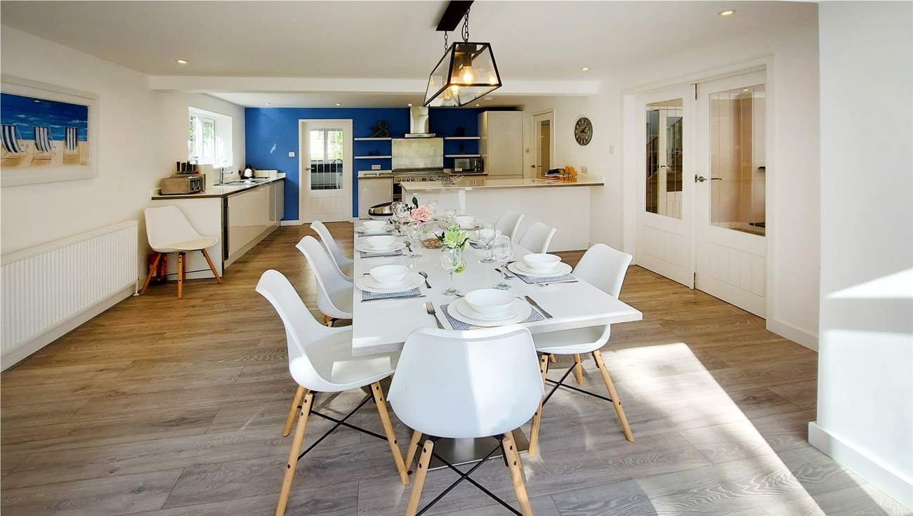 The stylish open plan kitchen and dining area.