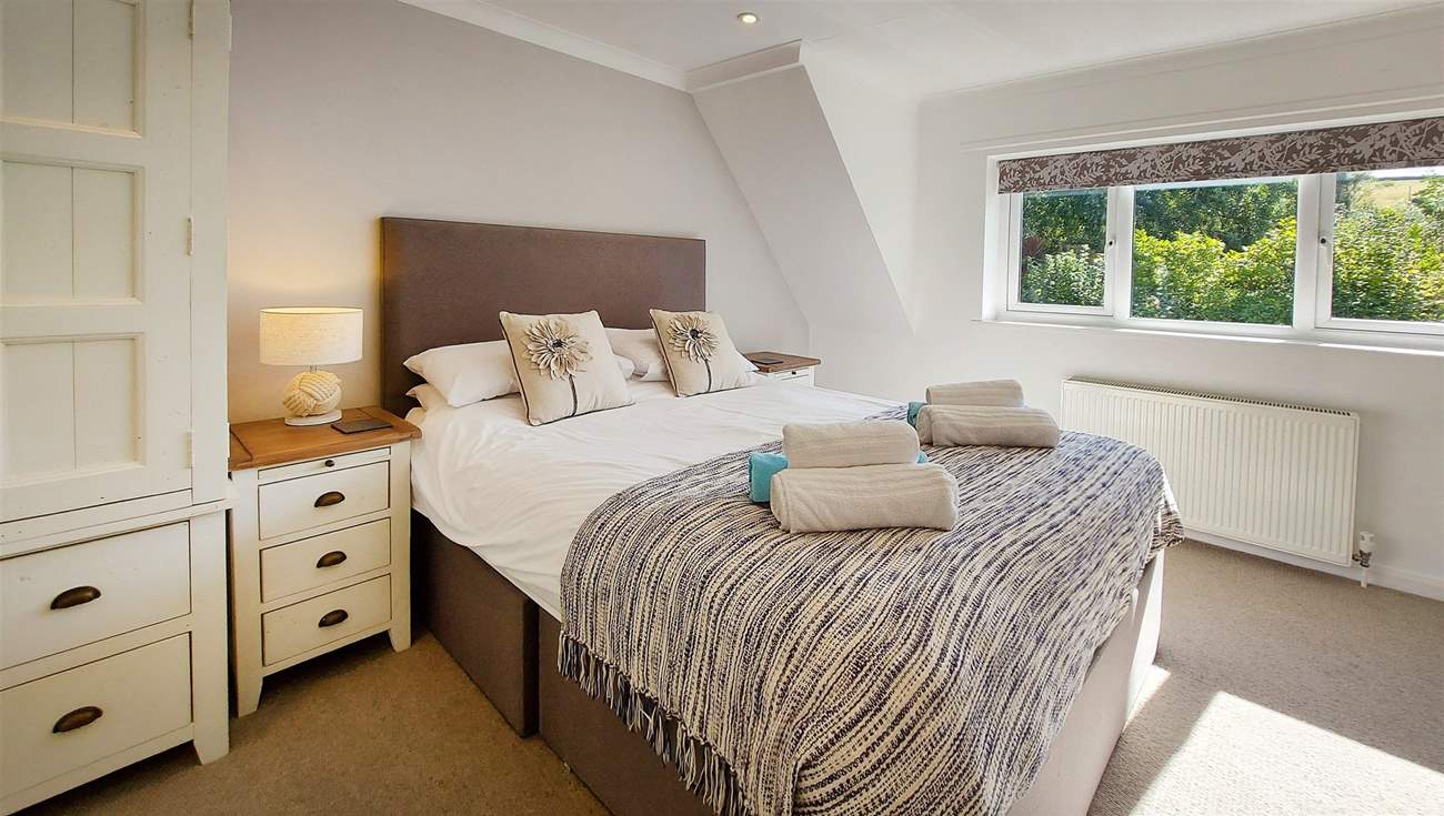 Bedroom 4 has a king-size bed.
