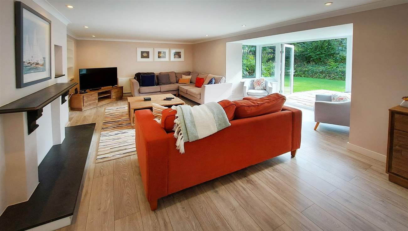 The beautiful living space leads out to the garden.