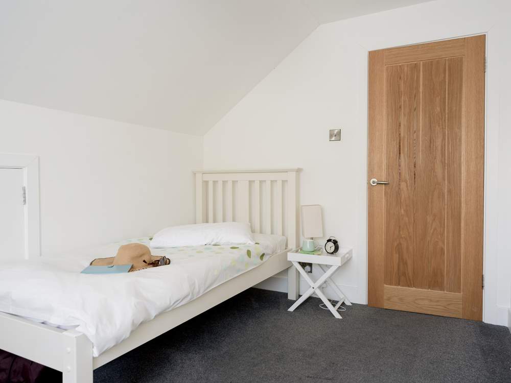 This sweet room is ideal for a child or adult.