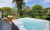 The perfect holiday pastime, relaxing in the hot tub.  - Thumbnail Image
